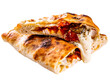 calzone pizza folded in half with meat, vegetables and cheese isolated on white background