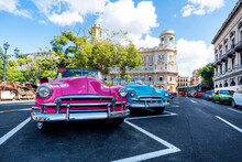 Classic Retro Cars Chevrolet In Different Bright Colors Are Parked In Front Of The National Museum Of Fine Arts On The Square, Near Monument To Jose Marti
