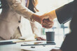© crizzystudio - Business partnership meeting concept. Image businessman s handshake. Successful businesswomen handshaking after a good deal.