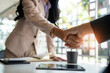 © crizzystudio - Business partnership meeting concept. Image businessman s handshake. Successful businesswomen handshaking after a good deal.