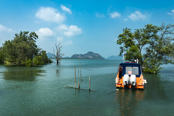 Wall Mural - Traveling with the view of Pileh Lake in Phi Phi Ley Island of the Andaman Sea, Krabi and Phuket provinces of Thailand. suitable for travel Famous for snorkeling, for outdoor summer vacation trips.