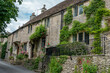 honey coloured Cotswold stone houses in Castle Combe Wiltshire England often named as the prettiest village in England