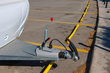 Parked a caravan or trailer's coupling details.