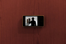 Monitor Digital Peephole Watching A Stranger Outside The Door