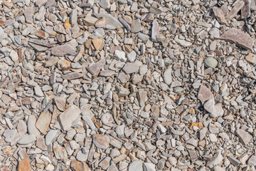 Wall Mural - Close up of white and grey stones.