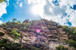 Beautiful image with the sun's rays in front of the rocky wall of a mountain in Chapada Diamantina, in the state of Bahia, Brazil