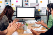 © Art_Photo - Group of professional asian business meeting and discussing strategy with new startup project.Creative business people planning with desktop computer with white mockup blank screens in modern office