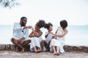 happy african american family enjoying and funning together. outdoor activity