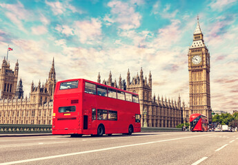  Red bus on Westminster bridge next to Big Ben in London, the UK.