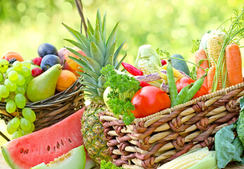 Wall Mural - Healthy food, vegetarian diet, organic fruit and vegetable in basket on table