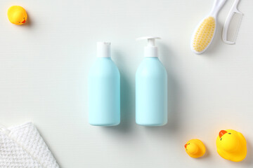 Sticker - Newborn baby shampoo and body wash packaging design on white table. Flat lay, top view.