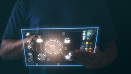 Wall Mural - Young businessman scanning his fingerprint for security, cybersecurity concept on the internet, the concept on virtual screen with hands typing on the keyboard.