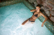 Woman relaxing in a whirlpool