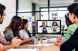 © Art_Photo - Group of professional asian business meeting and discussing strategy with new startup project.Creative business people video conference online meeting with business colleagues team in modern office