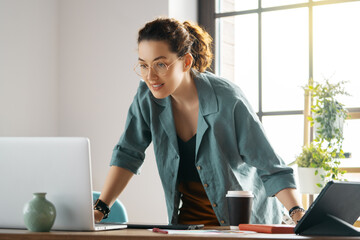 Woman is working at workshop