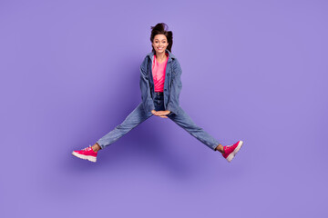 Canvas Print - Full size photo of nice overjoyed young lady jumping toothy smile isolated on violet color background