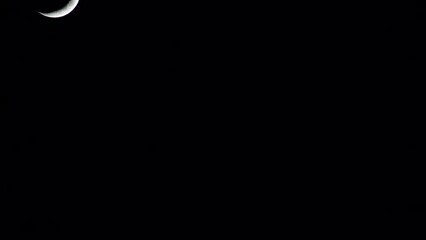 Moon crescent going down to the middle of the screen