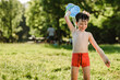 © ADDICTIVE STOCK - Happy boy playing with water