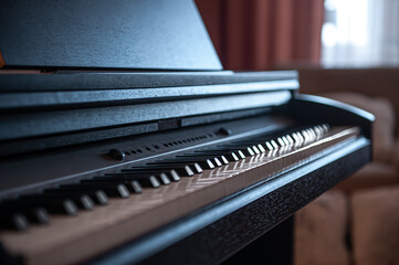 Wall Mural - Close-up, keys of an electronic piano on a blurred background.