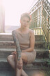Young tattooed woman summer portrait