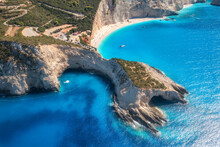 Aerial View Of Blue Sea, Mountains, White Sandy Beach At Sunrise In Summer. Porto Katsiki, Lefkada Island, Greece. Beautiful Landscape With Sea Coast, Yacht, Rocks, Azure Water, Green Forest. Top View