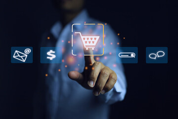 the man in the white shirt clicks on the shopping cart icon to shop online or e-commerce on a digita