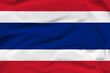 © EduardSkorov - Thailand national flag, folds and hard shadows on the canvas