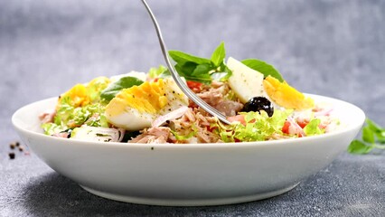 Wall Mural - rice salad and fork holding tomato