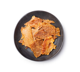 Canvas Print - Turkey jerky meat on plate. Dried sliced meat isolated on white background.