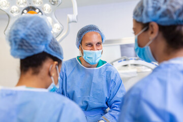 Canvas Print - Doctor and assistant nurse operating for help patient from dangerous emergency case .Surgical instruments on the sterile table in the emergency operation room in the hospital.Health care and Medical