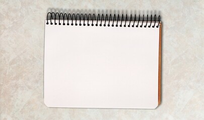 Wall Mural - Classic notepad or calendar on workplace background.