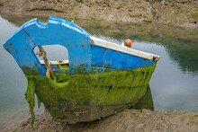 This Boat Sank And Ran Aground On The Sand.