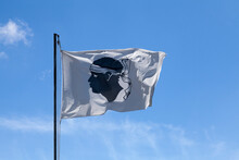 Corsican Flag Waving On Its Flagpole