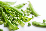 Fototapeta Mapy - Green peas closeup. Fresh green peas vegetable closeup on white background isolated.