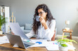 © Dragana Gordic - Business Career Concept. Businesswoman Smiling Sitting In Modern Office. Copy Space. Cheerful woman wearing wireless earphones and smiling.