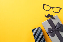 Father's Day Gift Design Concept With Gift Box And Necktie On Yellow Background.