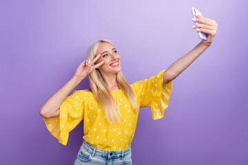 Poster - Photo of charming positive emotion lady make video vlog take selfie on telephone isolated on violet color background