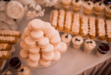 a lot of white cakes lie in a slide closeup