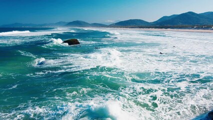 Poster - Joaquina beach with waves. Santa Catarina island in Brazil