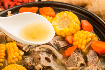 Wall Mural - Stewed mutton soup with corn and carrot