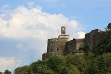 Beautiful View Of The Gjirokaster Castle Clock With A Blue Sky And White Clouds, Albania.