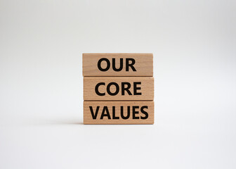 Our core values symbol. Concept words 'Our core values' on wooden blocks. Beautiful white background. Business and Our core values concept. Copy space.