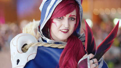 comic con cosplayer xayah from game battle character portrait