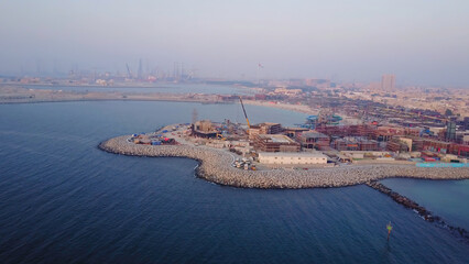 Aerial view of Dubai seaport United Arab Emirates . Top view of the construction of a water port in Dubai