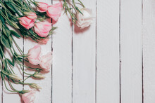 Background With Bright Pink Flowers On White Wooden Planks. Place For Text. Spring Background