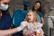 © Myroslava - Close-up of pretty little girl opening his mouth wide during treating her teeth by the dentist