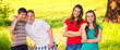 © Solid photos - Four happy teenagers having fun in the nature on a sunny summer day
