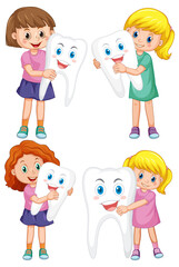 Sticker - Set of happy kids holding a big tooth on white background