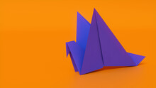 Bird Made From Folded Blue Paper Against Orange Background. Origami Concept With Copy Space.