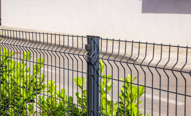 Wall Mural - Steel grating fence made with wire.
